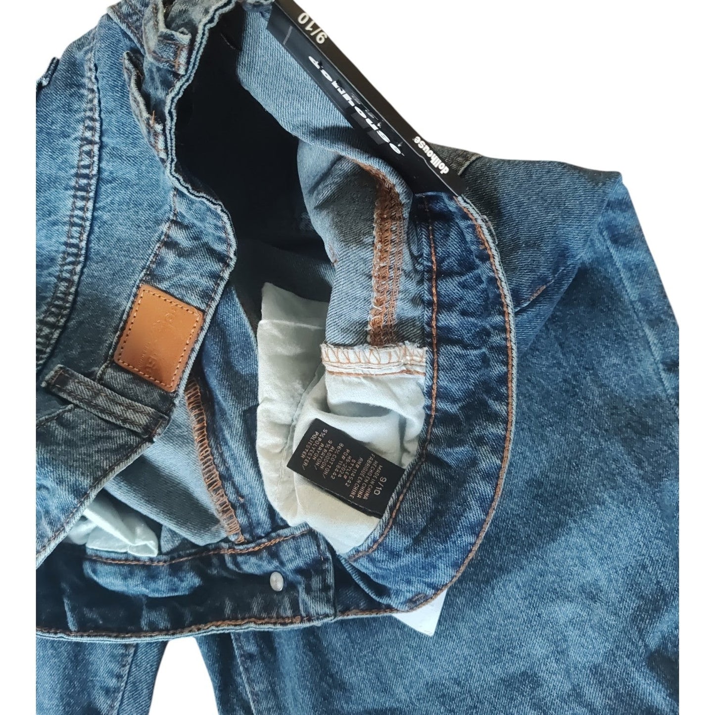 Dollhouse ripped jeans material