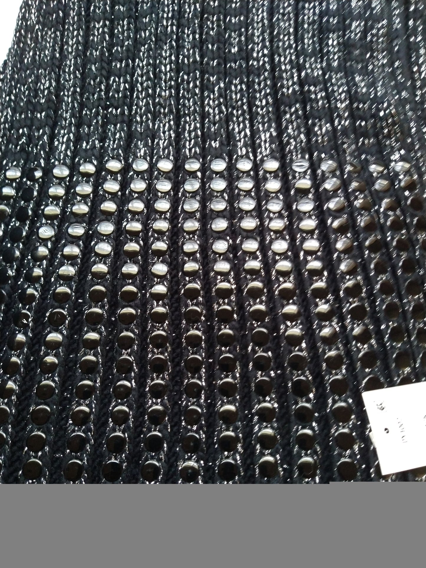 Tricot côtelé en lurex à clous plats