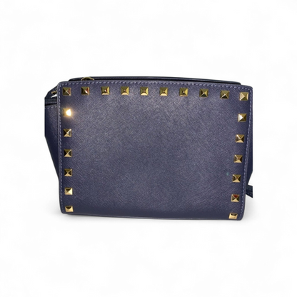 Michael MK kors Women's Navy Blue Selma messenger bag with gold studs accent.
