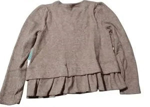 CECE pink sweater with ruffled layers on a white background