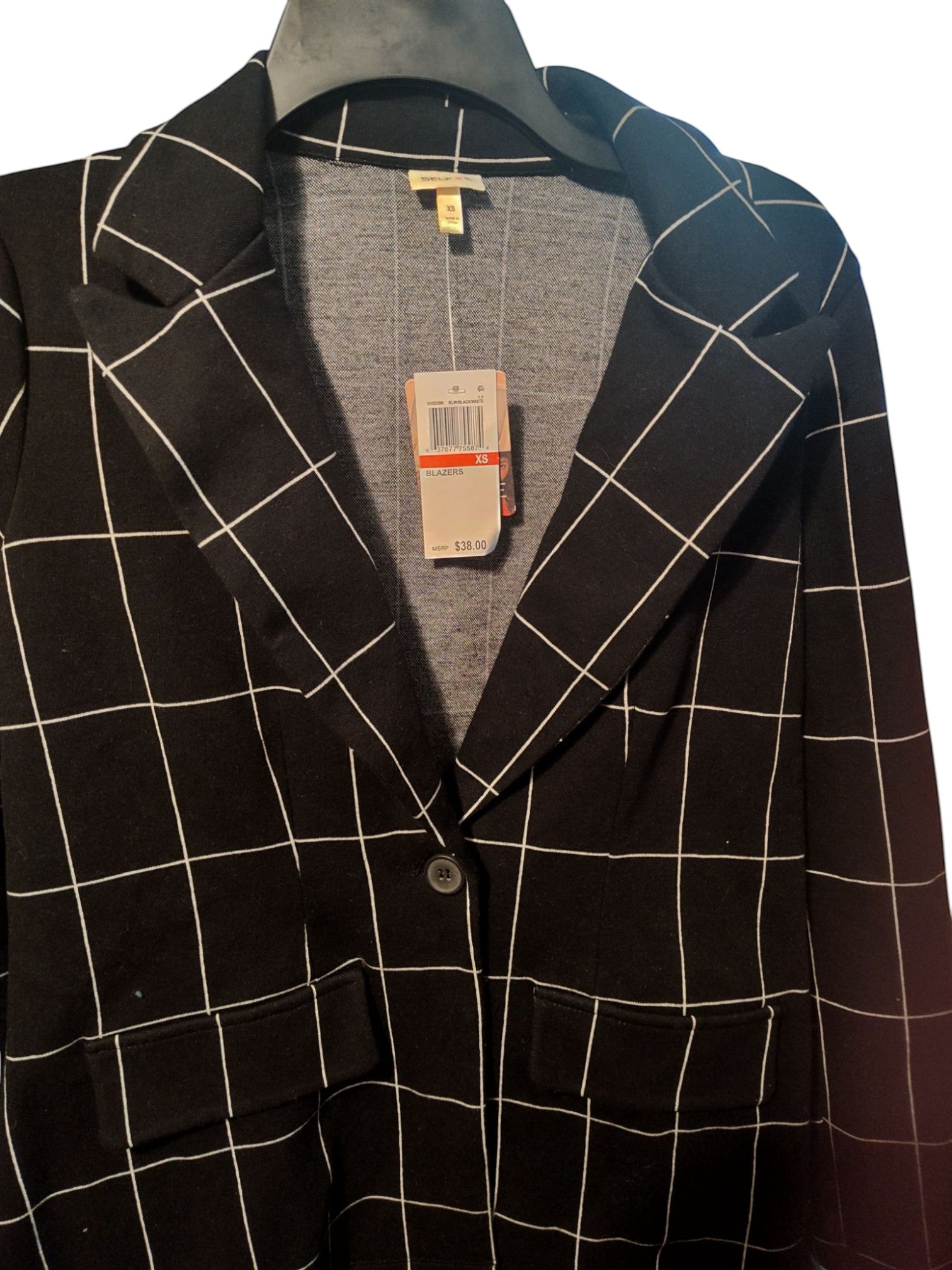 Self Esteem black and white windowpane patterned blazer with notched lapels and single-button closure.